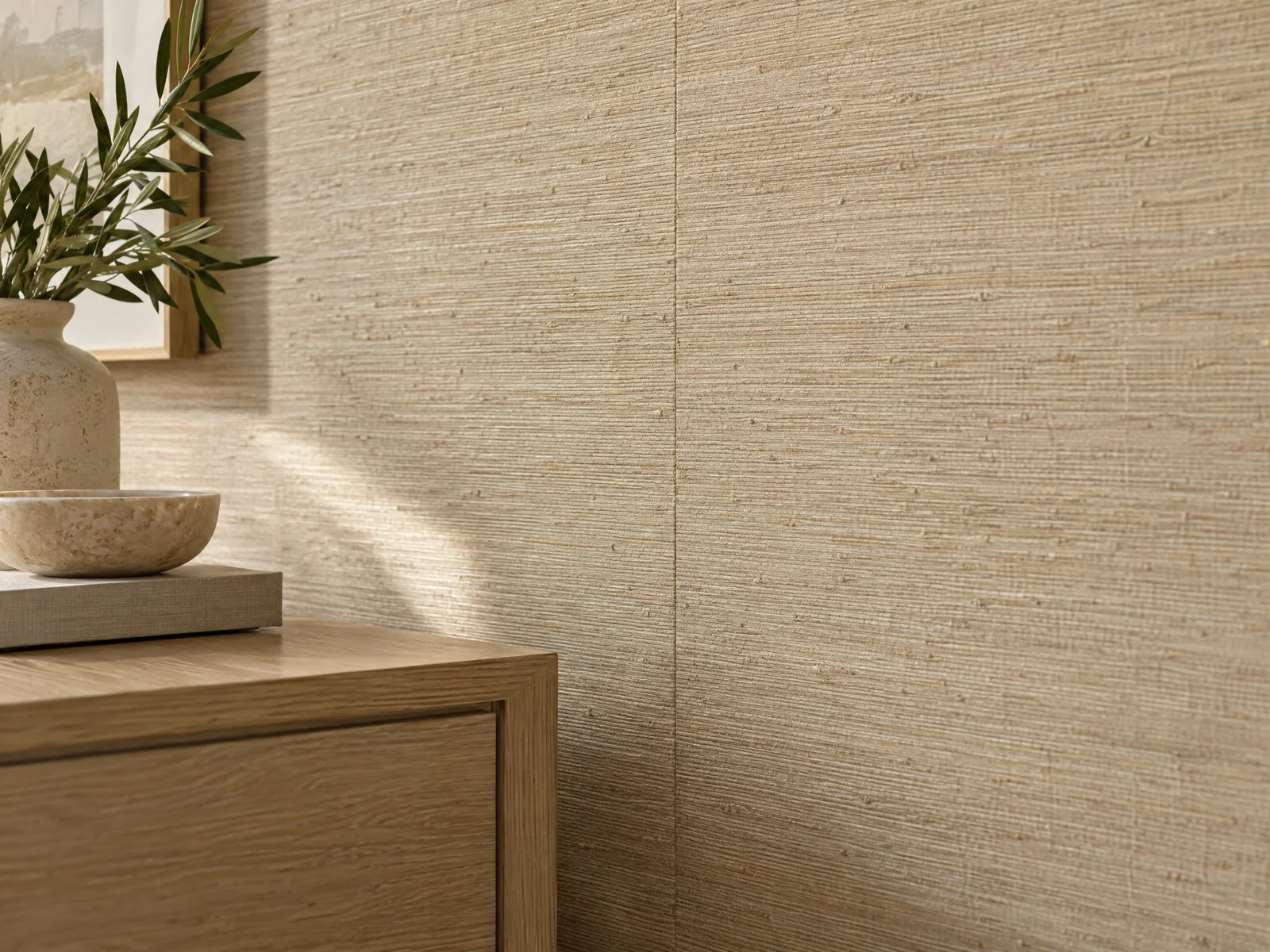 Close detail of textured wallcovering with a fine vertical seam